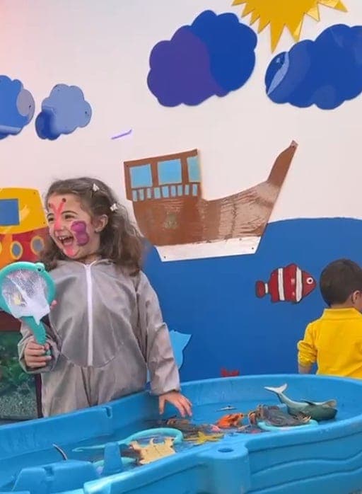 Children having fun with water play